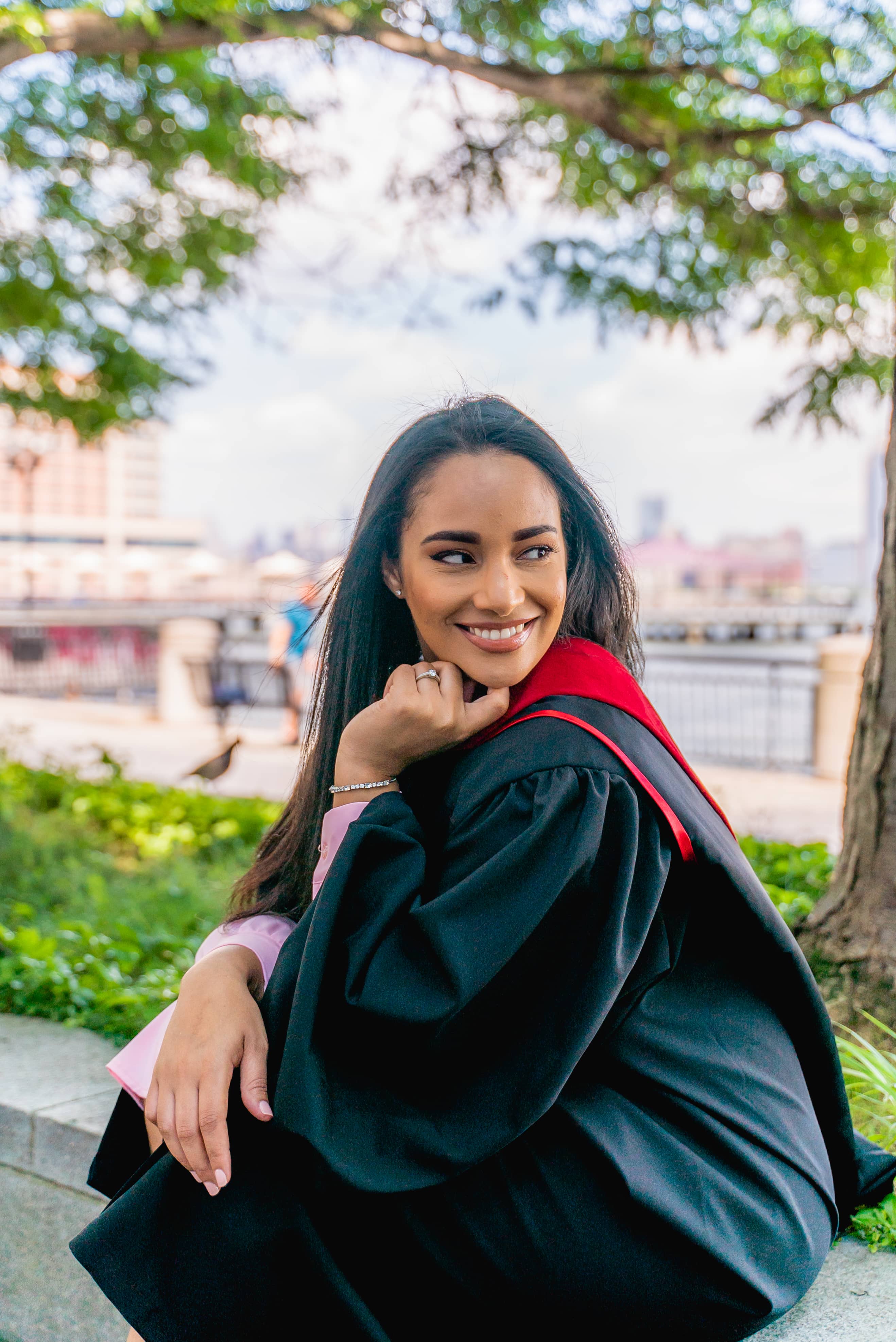 Graduation portrait with the NYC skyline by JQ Creative
